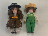 Lot of 2 Vintage Bisque Dolls with outfits and hats