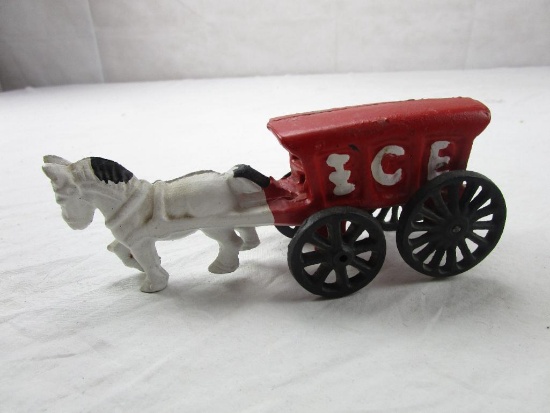 Cast iron horse drawn ice cart reproduction figurine. 7" long.