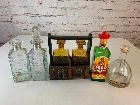 Lot of 6 Vintage Glass liquor Decanters-D'usse, Walkers, El Toro and 2 Amber Glass with rack