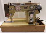 Vintage Deluxe Fleetwood sewing machine with extras