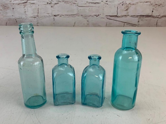 Lot of 4 Blue Glass Bottles