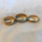 Lot of 3 Similar Gold-Toned and Silver-Toned Band Rings Sizes 8, 8, and 11 | 9.23 grams TW