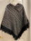 Beautiful black with woven silver ladies poncho with zipper collar Sz. S