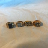 Set of 4 Similar Gold-Toned Unisex Rings with Various Center Gems