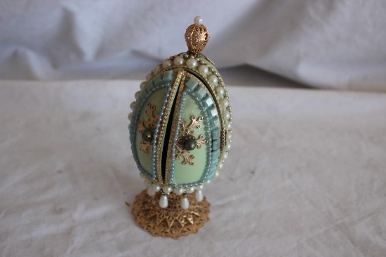 Highly Decorated Egg With Doors and Figures Inside