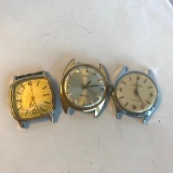 Lot of 3 Similar Gold-Toned and Silver-Toned Watch Clock Pieces