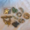 Lot of 9 Misc. Gold-Toned, Silver-Toned, and Rhinestone Costume Brooches