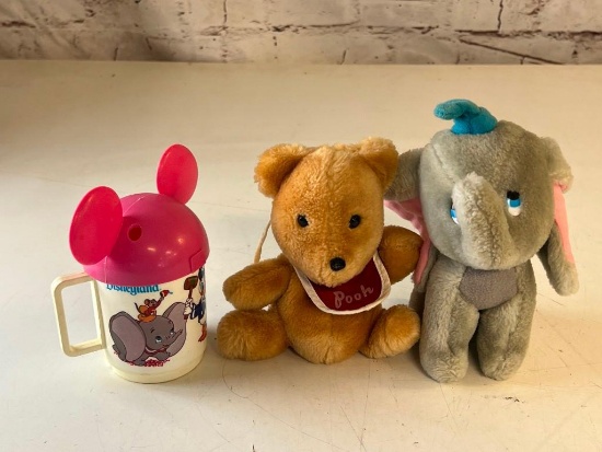 Vintage Walt Disney Winnie The Pooh and Dumbo Plush plus a Disneyland Cup with lid