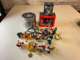 Lot of Wat Disney Christmas Ornaments with a String of Disney Lights includes a Storage Tin