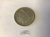 1882 P Morgan Silver U.S. Dollar 90% silver in circulated condition.
