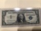 1957 B $1.00 Blue Seal U.S. Bill in circulated condition serial number W22984117A