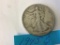 1945 S U.S. Walking Liberty Half Dollar in circulated condition, 90% Silver