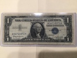 1957 B $1.00 Blue Seal U.S. Bill in circulated condition serial number W56718372A