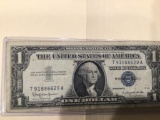 1957 B $1.00 Blue Seal U.S. Bill in circulated condition serial number T91886629A