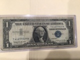 1957 B $1.00 Blue Seal.U..S. Bill in circulated condition serial number T41277919A