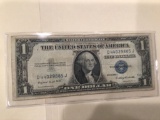 1935 G $1.00 Blue Seal.U..S. Bill in circulated condition serial number D44029885J