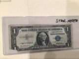 1957 $1.00 Blue Seal Star Note .U..S. Bill in circulated condition serial number *86109598A