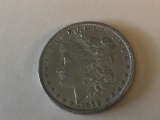 1879 P with 7 tail feathers Morgan U.S. Dollar in A.U. Condition 90% Silver