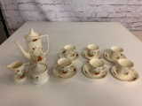 Vintage Porcelain Tea set with 6 Cups and Saucers, Creamer, Sugar Bowl and Tea Pot