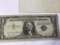 1957 B U.S Blue Seal Dollar Serial Number U11931468A in circulated condition