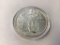 .999 Pure Silver One ounce, Lady Liberty Coin, in uncirculated condition with minor toning
