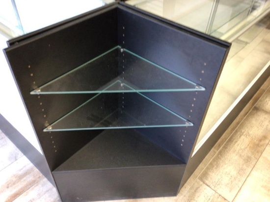 Corner Display Case with 2 glass shelves measures 18 x 38 inches and as you can see by the pictures