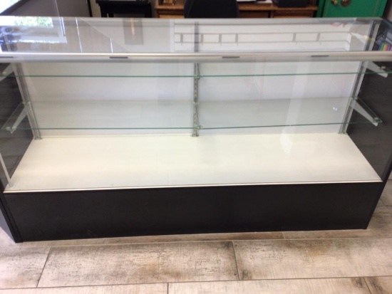 Very nice display case with 2 glass selves, 70 inches long, 18 inches deep and 38 inches tall