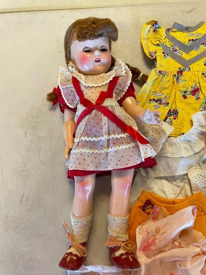Vintage doll with large lot of clothing