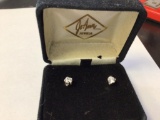 Silver tone earrings with cubic zirconia stones