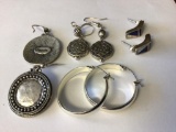 Lot of four Silver Tone Costumes Earrings for pierced ears.