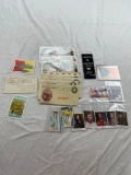 Lot of vintage ephemera items: cigarette cards, receipts, post cards, and more