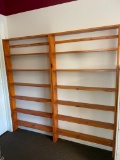 Two tall solid wood media storage shelves. No shipping.