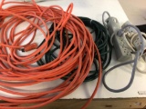 Lot of two extensions cords, orange is 100 feet, green is 50 feet & Two 6 plug serge protectors