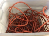 Lot of two extensions cords, orange is 100 feet, yellow is 50 feet & Three 6 plug serge protectors