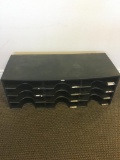 Black plastic storage cubby used for employee timesheets and mail; lots of other uses