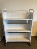 White metal 6 shelf library book cart on wheels. No shipping.
