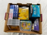 Box lot of VHS, DVD-R, DVD-RW, CD-R, and CD-RW