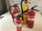 Lot of four various size full fire extinguishers