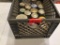 Bin full of jars with nails, screws, hocks, nuts and other miscellaneous in the jars.