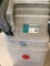 seven various size clear totes with lids.
