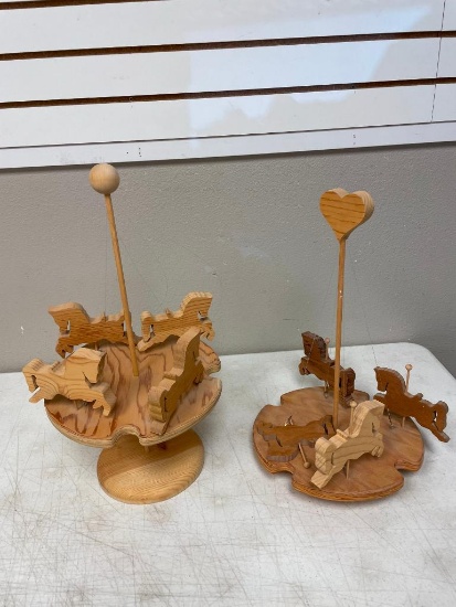 Two unfinished wood craft project horses and carousels