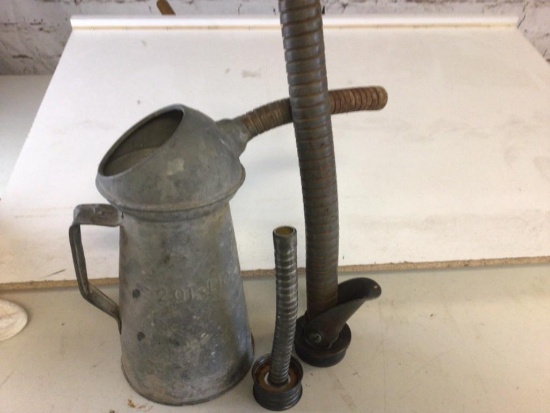Three vintage items, vintage 2 quart oil Pitcher with spout, two vintage spouts for gas cans.