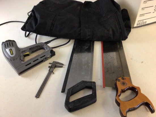 Miscellaneous lot consisting of Two handsaws, Stanley Electric Staple Gun, Vintage Calipers