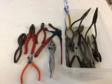 Lot of pliers including needle nose, Slip joint, diangle pliers, snap ring pliers.