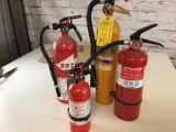 Lot of four various size full fire extinguishers