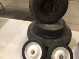 Lot of five wheel barrel or trailer wheels, two 7? wheels, two 10? wheels & 15? wheel.