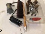 Lot of miscellaneous items, 2 antique door knobs, trailer hitch, channel locks, 2 oil guns and brush