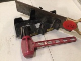 Stanley Meter Saw and red hard plastic mallet.