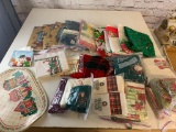 Bin full of Christmas Place Settings and more- Napkins, Place Mats, Towels, Table Cloths and more