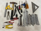 Large lot of various hand tools: wrenches, screw drivers, hammer, level, and more